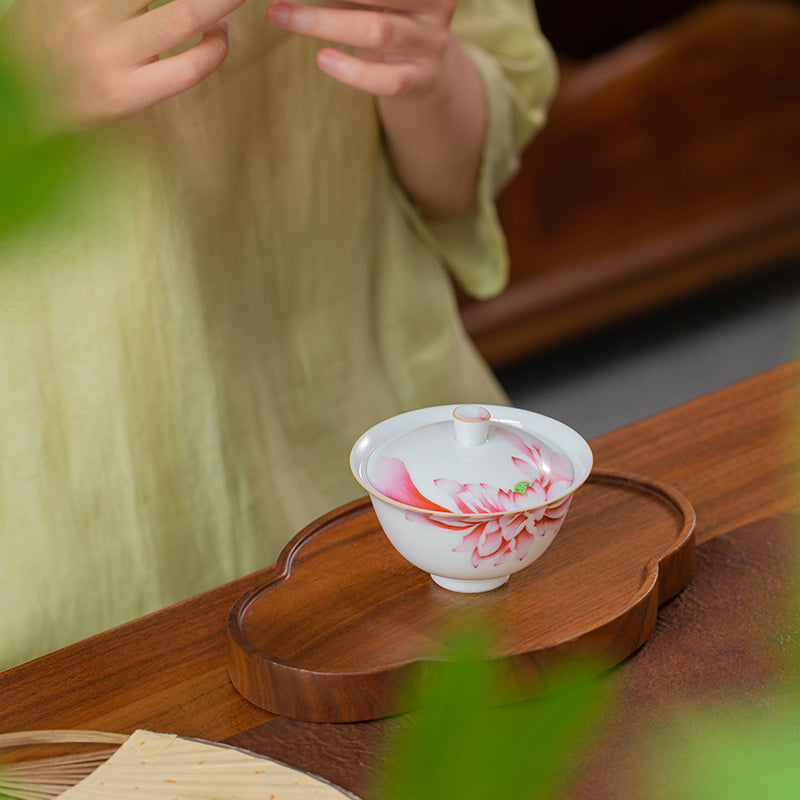 FAMILLE ROSE GOURD AND LOTUS TEA SET