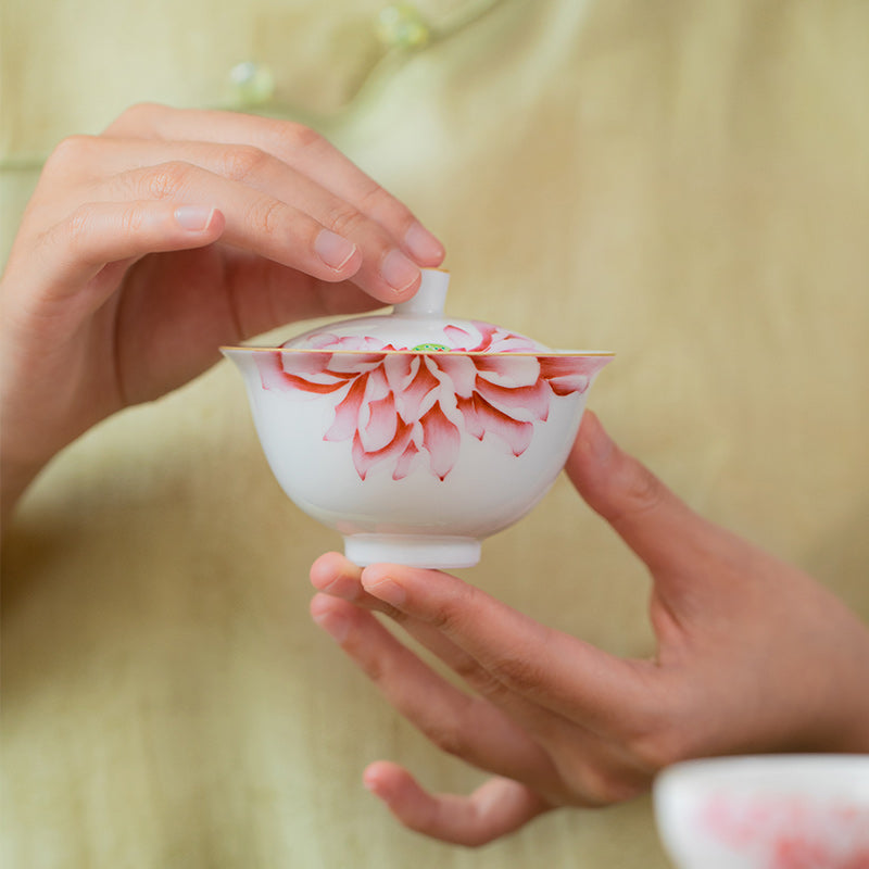 FAMILLE ROSE GOURD AND LOTUS TEA SET